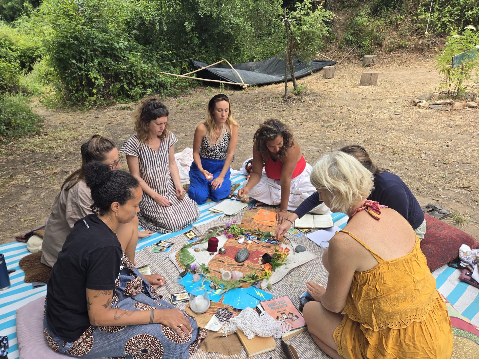 Women gathered in a circle outdoors